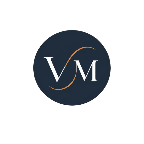 A circular navy blue logo featuring the white letters 'VM' with an orange curved line detail, centered on a plain white background.